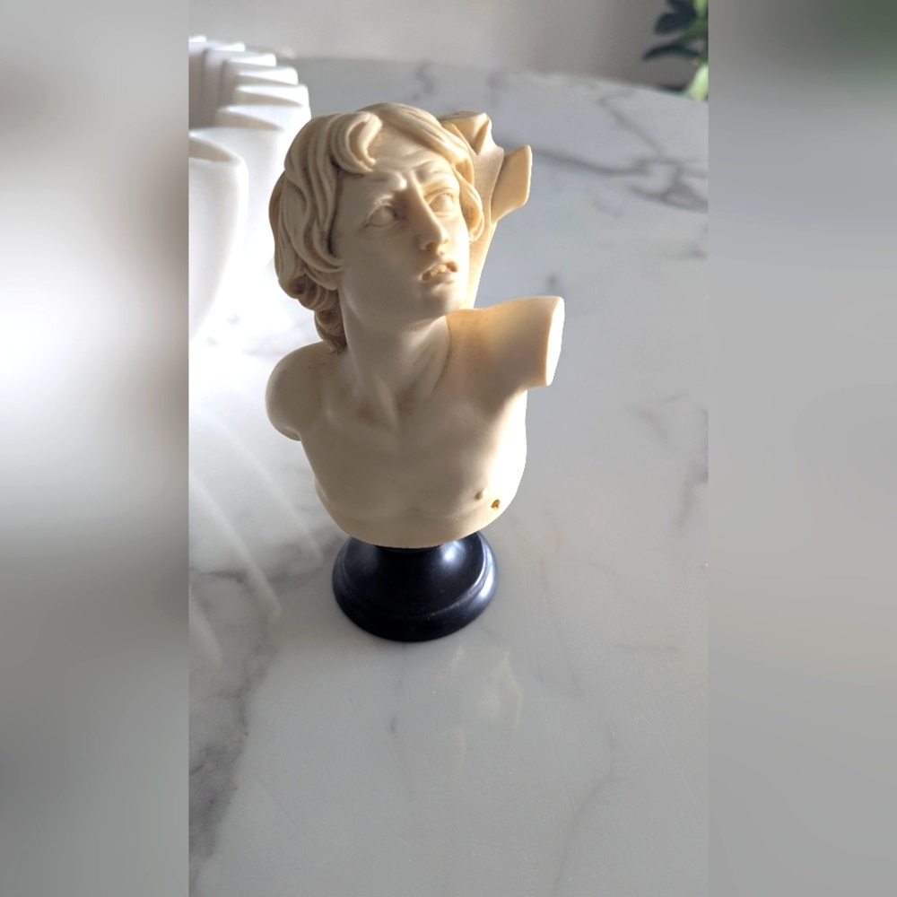 Elegant Cream Bust Sculpture on Black Base